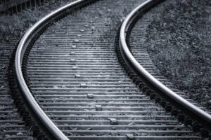 Black and white railroad train tracks